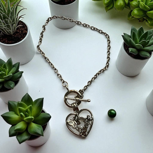 29 pulsera corazón mariposa