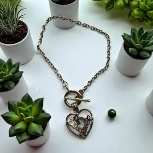 29 pulsera corazón mariposa